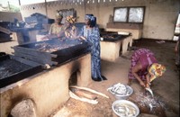 women smocking fish